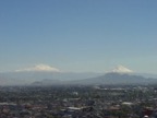 The snowcapped vulcanos Popocatepetl and Ixtaccihuatl