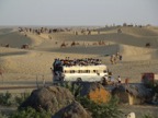 Busloads of people visiting the sanddunes in a place called Sam