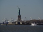 Another boatload of tourists heading for Lady Liberty