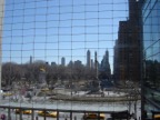 This is a view from inside the new Time Warner building onto Columbus Circle and Central Park. This building has public toilets on the second floor and a market in the basement where you can get sandwiches and much more.