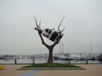 'Cow in a tree' statue in Melbourne, based on a true story of a cow being found in a tree after a flood